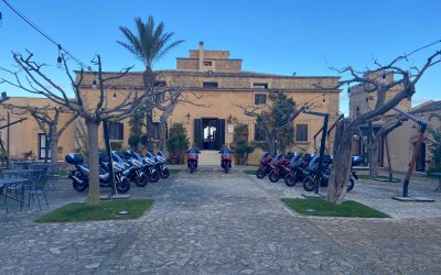 honda bikes in front of villa